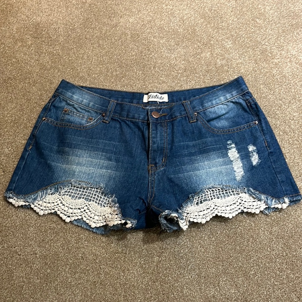 Dark blue distressed acid wash jeans/denim shorts with lace detail